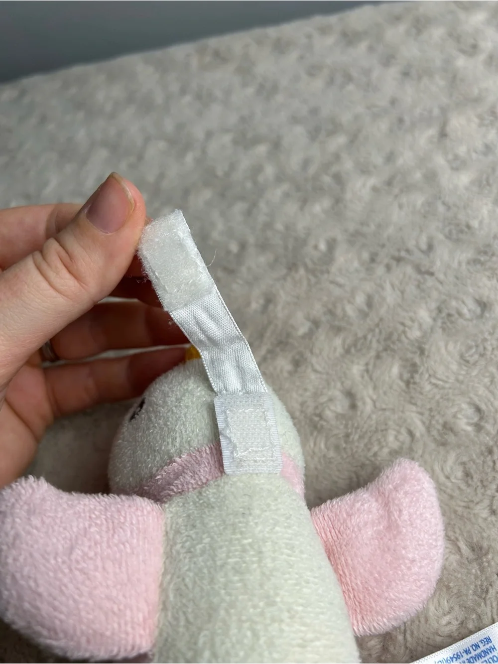 RaZbuddy Pink Penguin Plush Pacifier Holder White Orange RaZbaby Lovey
